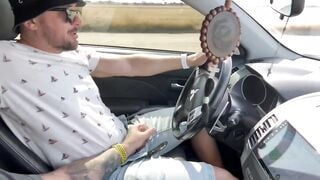 Gay friends enjoy blowjob in running car