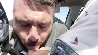 Gay friends enjoy blowjob in running car
