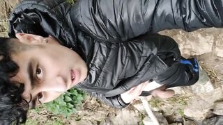 American young man roams in the park with dick flashing