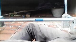 Indian black guy jerks his dick in terrace